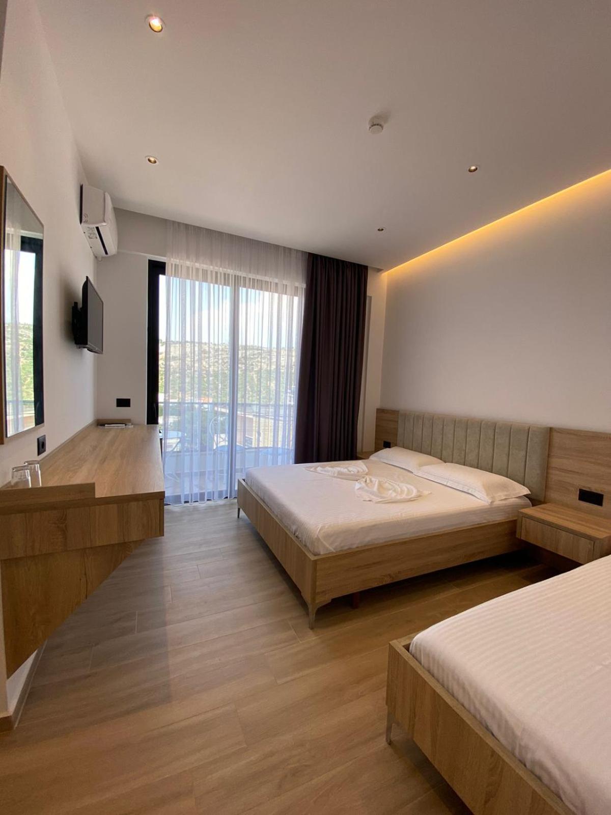 Gl Hotel Ксамил Екстериор снимка